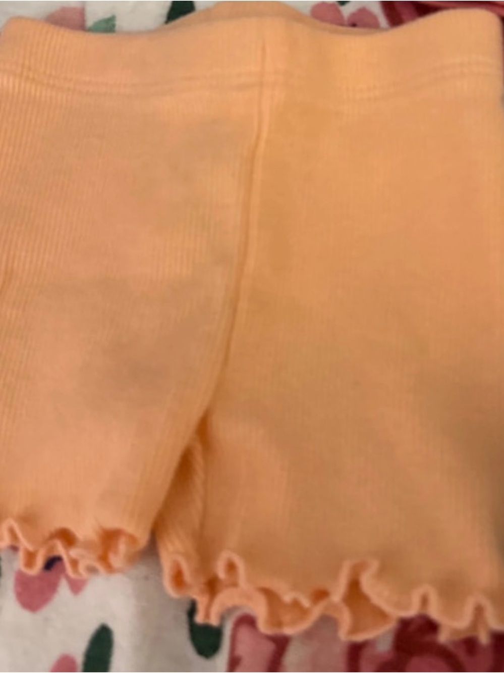 Peach Ribbed Ruffle Hem baby Shorts